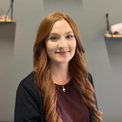 A headshot photo of Taylor, the Front Desk person at Balance Chiropractic